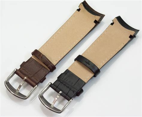 curved leather watch strap.